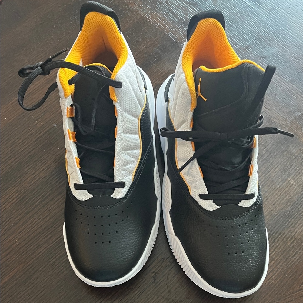 Jordan Kids Black and White Sneakers with Yellow Accents
